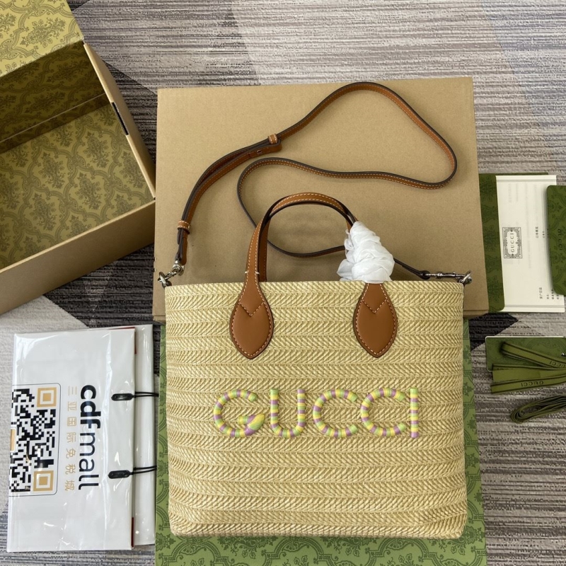 G*u*i shopping bags